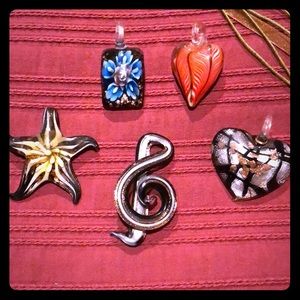 Five hand blown glass pendants